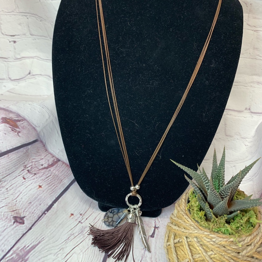 Necklace, long with charms.